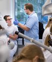 Photo showing dental students in the clinic
